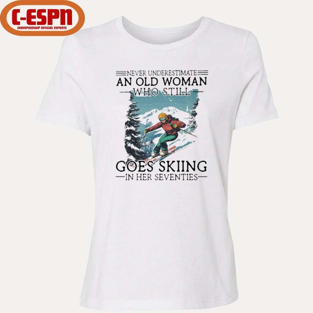Official Never Underestimate An Old Woman Who Still Goes Skiing In Her Seventies Shirt