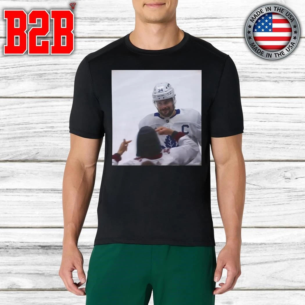 Auston Matthews Smirks At The Avs Fans Shirt