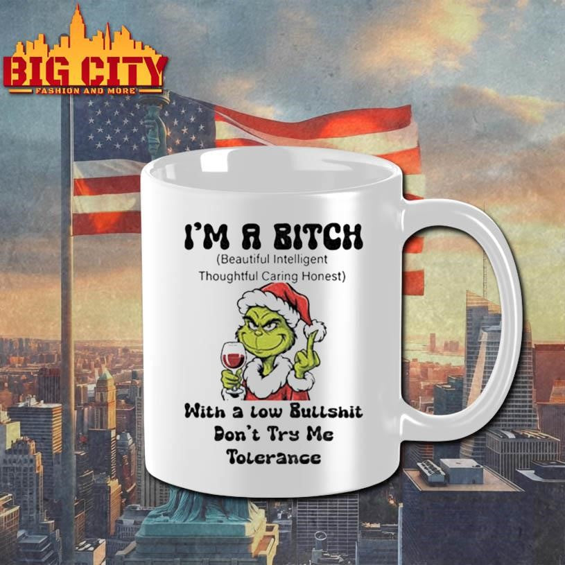 Grinch Santa hat middle finger I’m a bitch with a low bullshit don’t try me tolerance Christmas shirt
