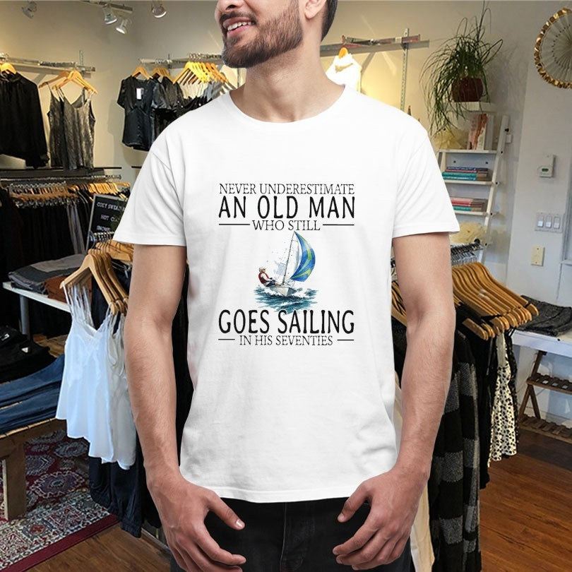 Official Never Underestimate An Old Woman Who Still Goes Sailing In Her Sixties Shirts