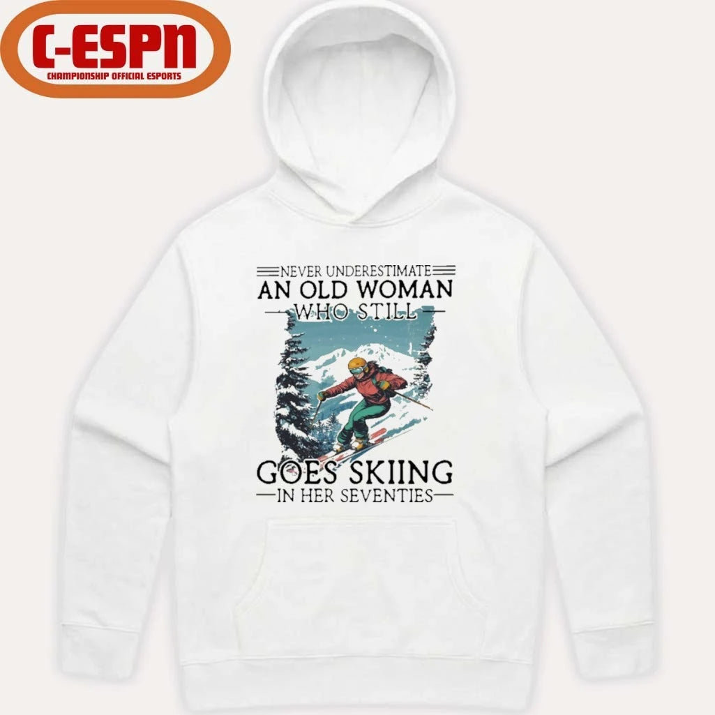 Official Never Underestimate An Old Woman Who Still Goes Skiing In Her Seventies Shirt