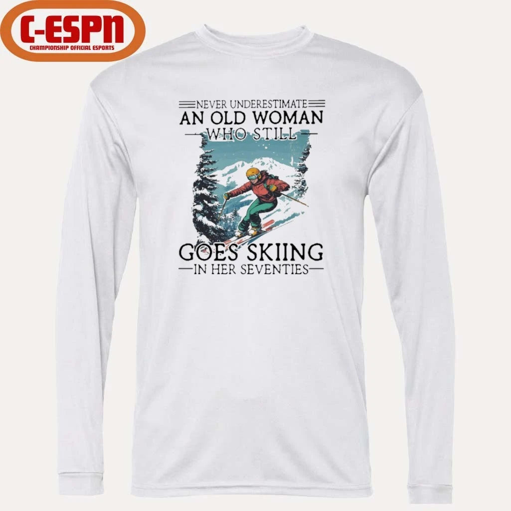 Official Never Underestimate An Old Woman Who Still Goes Skiing In Her Seventies Shirt