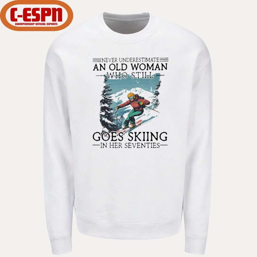 Official Never Underestimate An Old Woman Who Still Goes Skiing In Her Seventies Shirt