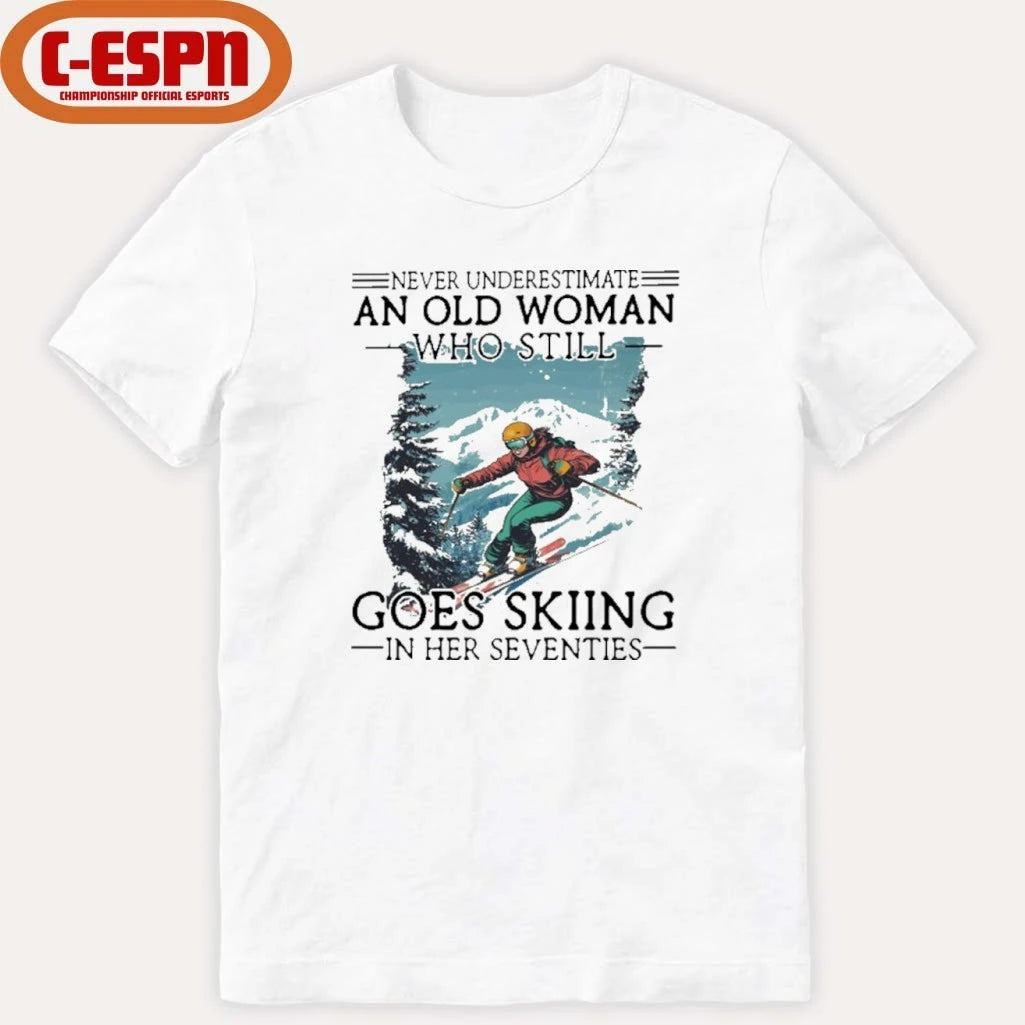 Official Never Underestimate An Old Woman Who Still Goes Skiing In Her Seventies Shirt