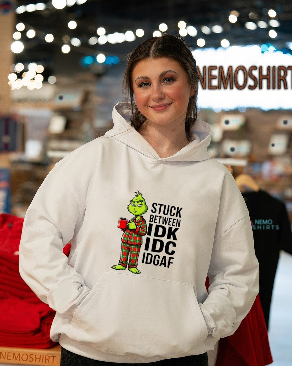 Stuck between IDK IDC IDGAF Grinch shirt