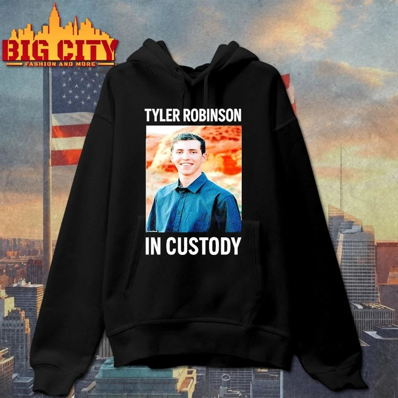 Tyler Robinson in custody shirt