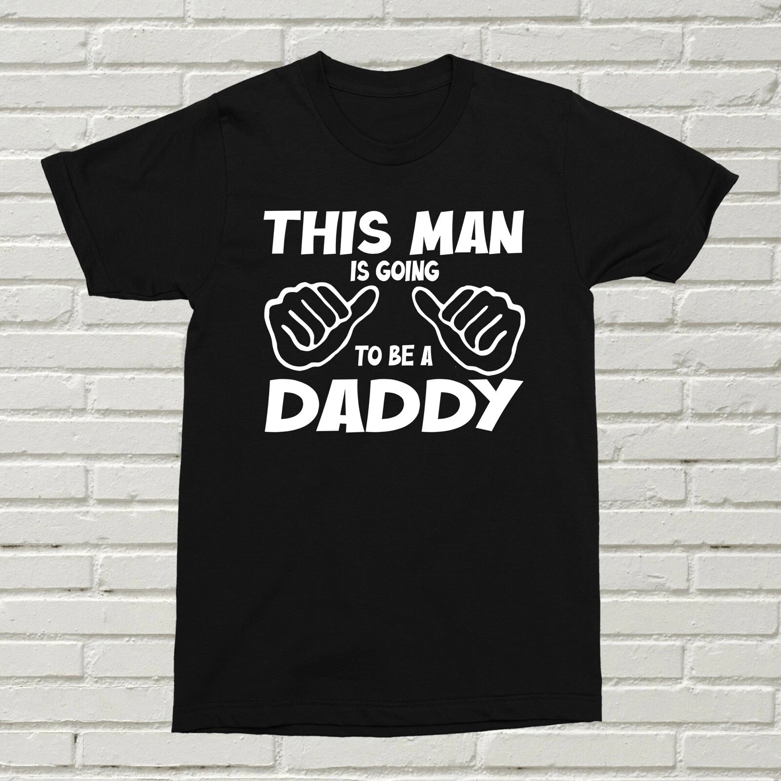 This Man Is Going To Be A Daddy T-Shirt Funny Birthday New Dad Gift Christmas